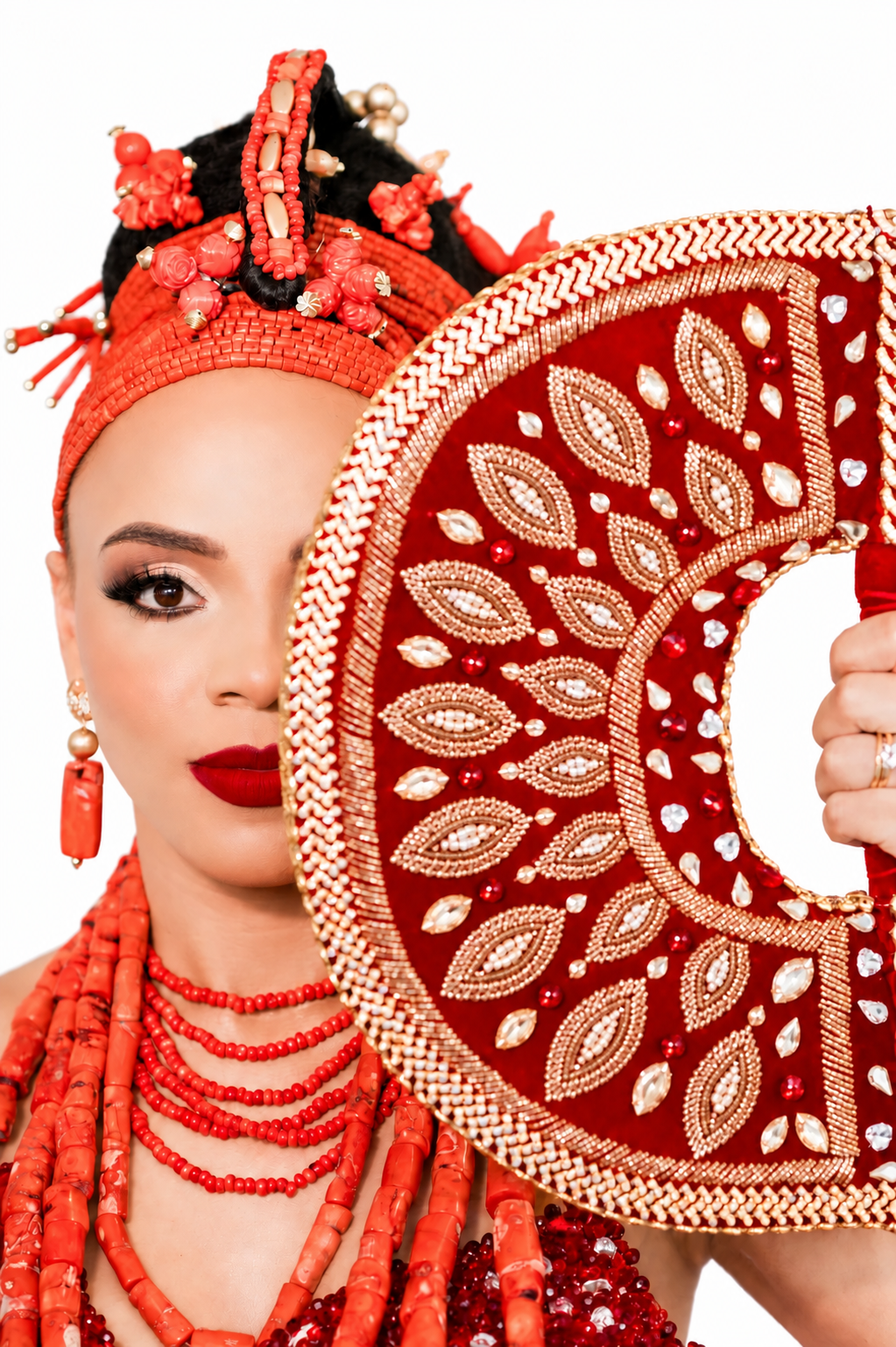 African couture portrait with embroidered fan